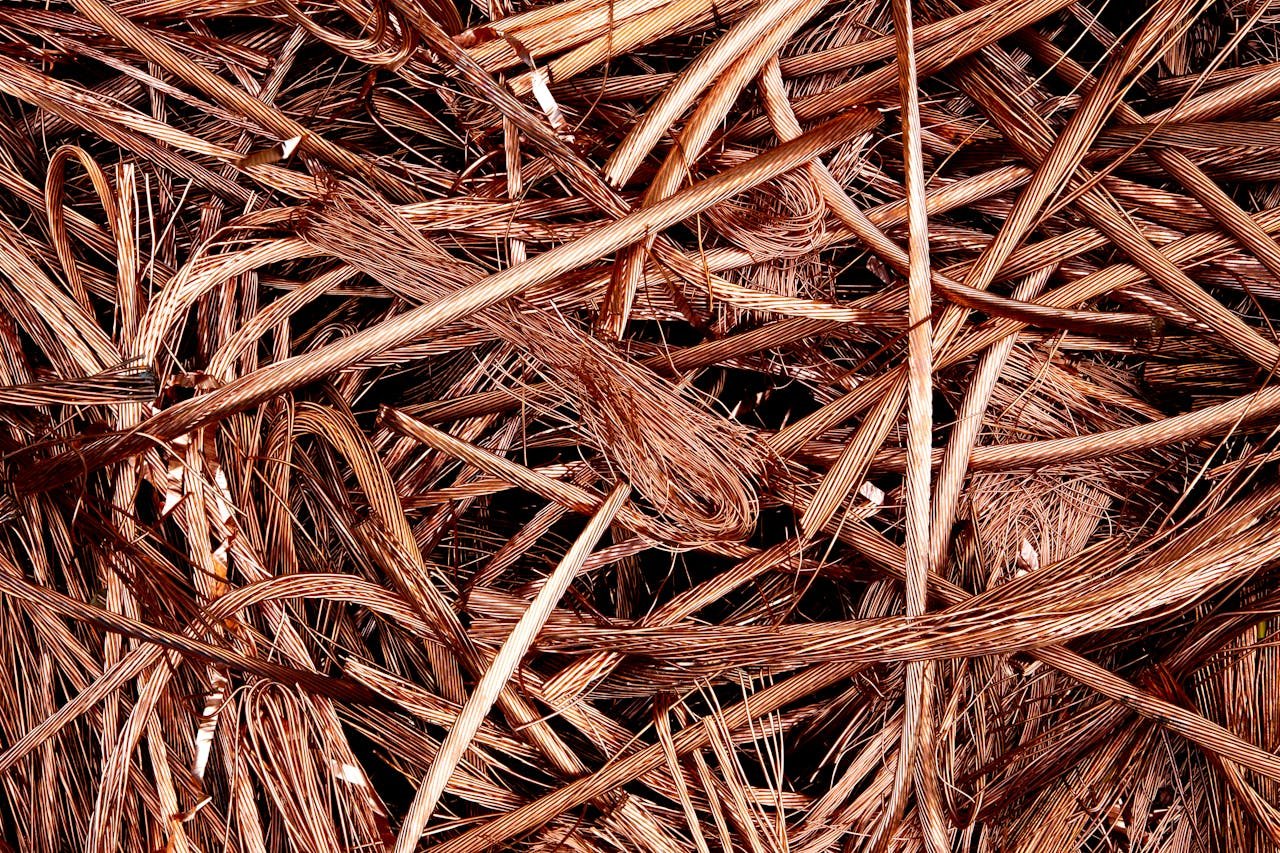 why-choose-us Close-up view of intertwined copper wires ready for recycling, emphasizing industrial reuse.